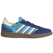 An Adidas Busenitz sneaker in blue and white suede and mesh with a brown gum sole.