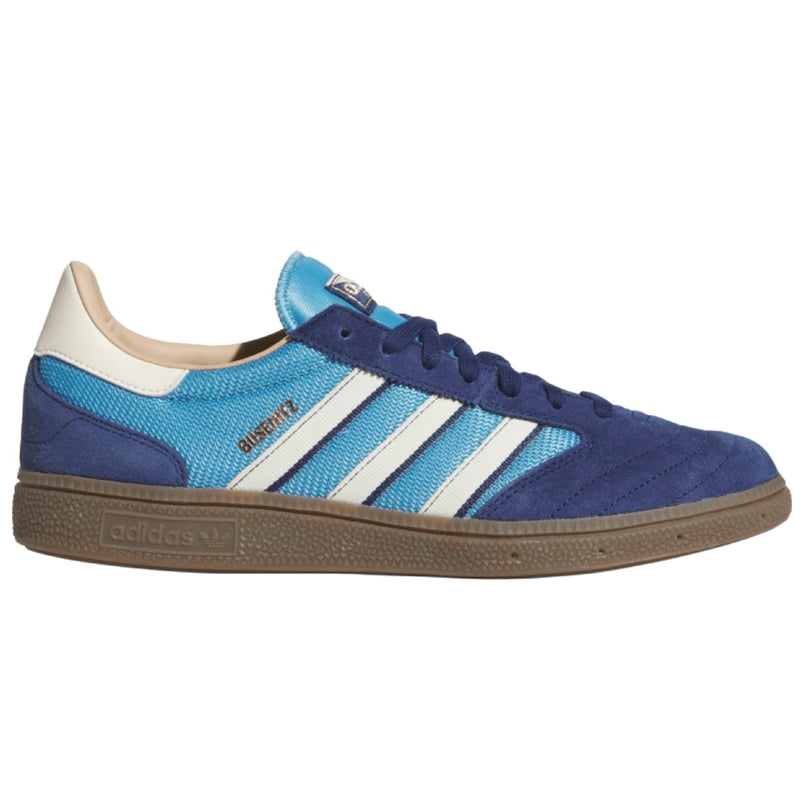 An Adidas Busenitz sneaker in blue and white suede and mesh with a brown gum sole.