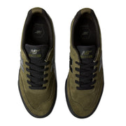 A pair of New Balance 340 sneakers shown from a top-down view. The shoes feature an olive green suede and mesh upper with black laces, black soles.