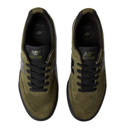 A pair of New Balance 340 sneakers shown from a top-down view. The shoes feature an olive green suede and mesh upper with black laces, black soles.