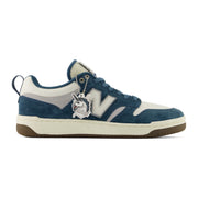 New Balance Numeric 480 Focus Skateshop in Blue/White, right side view with unicorn charm
