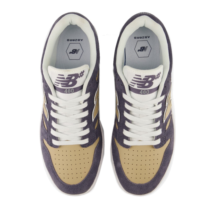 A pair of New Balance 480 sneakers shown from a top-down view. The shoes feature a color-blocked design with dark grey suede overlays, beige suede toe panels, white laces, and a white midsole.