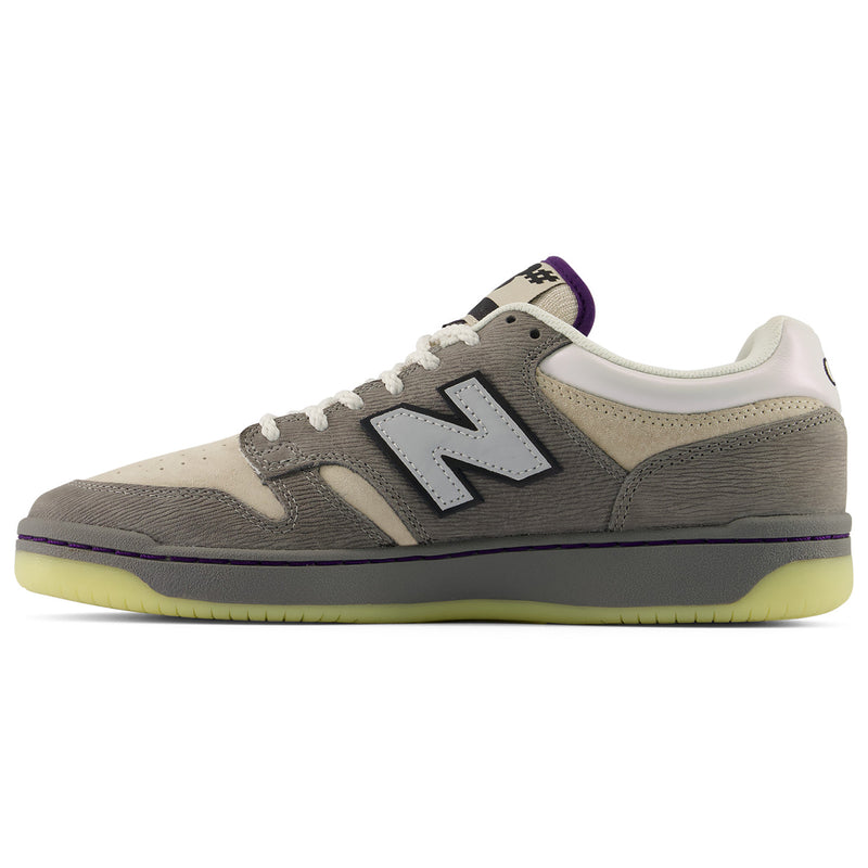 New Balance Numeric 480 x Civil sneaker in a gray and beige colorway, featuring a textured gray suede upper, cream leather overlays, a white laces and collar, a gray side 'N' logo, and a translucent light green gum sole.