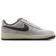  Nike SB Air Force 1 x Yuto sneaker in light gray with a dark gray Swoosh, matching gray laces, and a cream-colored midsole.