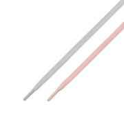 Nike SB Air Force 1 x Yuto Two flat shoelaces, one light gray and one light pink, shown diagonally on a plain white background.