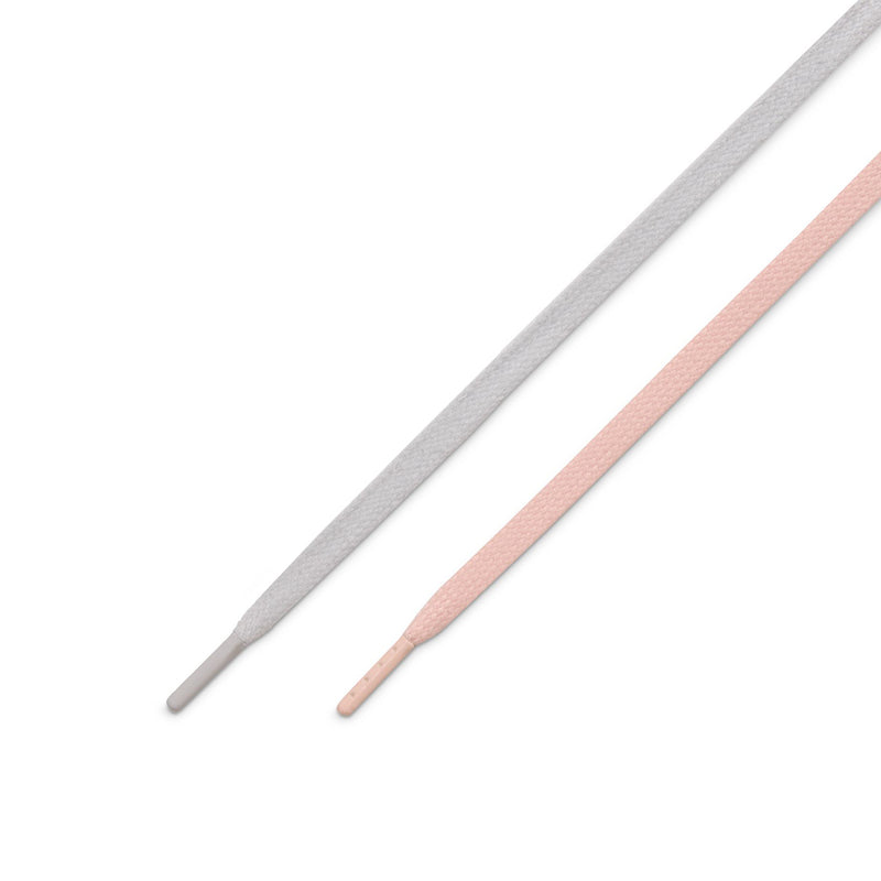  Nike SB Air Force 1 x Yuto Two flat shoelaces, one light gray and one light pink, shown diagonally on a plain white background.