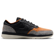 Nike SB PS8 - Friends & Family low-top sneaker in black, orange, and gray leopard print, shown from a side profile on a white background.