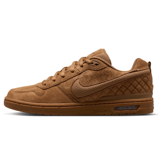 A Nike low-top sneaker in a monochromatic brown colorway, featuring suede and textured mesh panels, a quilted pattern on the heel, and a gum sole.