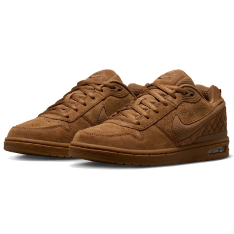 A pair of Nike SB Paul Rodriguez 1 Low sneakers in a monochromatic brown colorway, featuring suede and textured mesh panels, laces, and a gum sole.