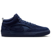 Nike SB React Leo - Navy/Navy A dark navy blue Nike mid-top sneaker with suede and mesh textures, featuring a matching navy swoosh on the side