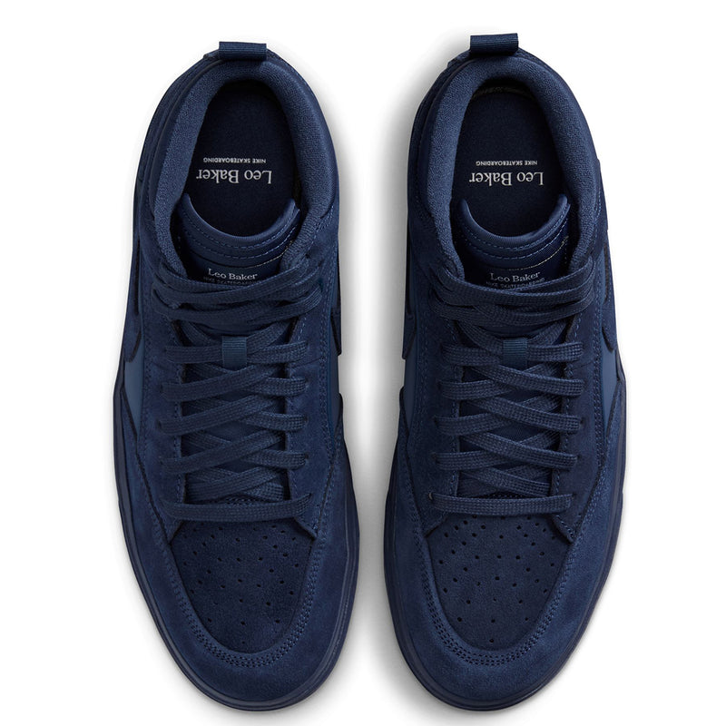 Nike SB React Leo - Navy/Navy A pair of navy blue suede high-top sneakers shown from a top-down view on a white background. The brand name 'Leo Baker' is printed in white on the tongue of each shoe.