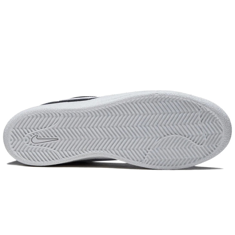White Nike shoe sole with a textured chevron pattern and a subtle embossed Swoosh logo.