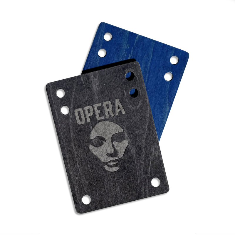 Two Opera ectangular metal mounting plates with rounded corners and four screw holes, shown on a white background. The front plate is dark gray/black with a brushed finish and engraved 'OPERA' text above a stylized face graphic.