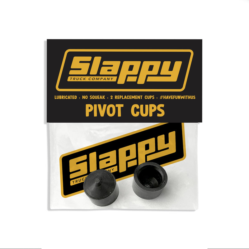 Slappy Truck Company Pivot Cups in their original retail packaging, featuring two black rubber replacement pivot cups inside a clear bag with a black and yellow Slappy label.