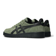 ASICS Japan Pro skate shoes in Moss/Black, rear three-quarter view showing black heel panels.