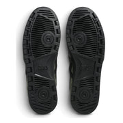 ASICS Japan Pro skate shoes in Moss/Black, bottom view showing black rubber outsole tread.