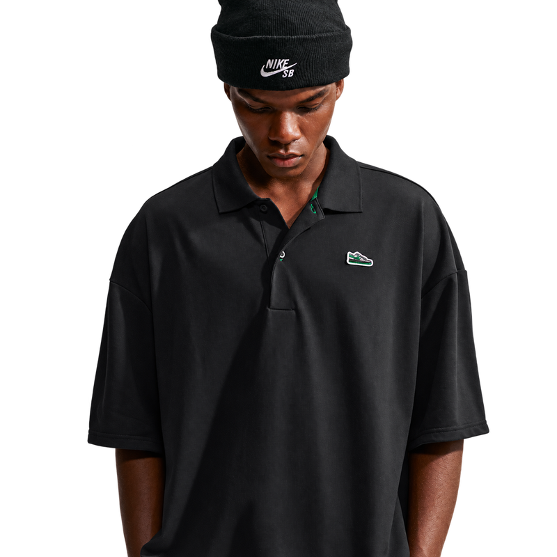 Nike SB Solid Break AF1 Polo in Black / Court Green, front view on model